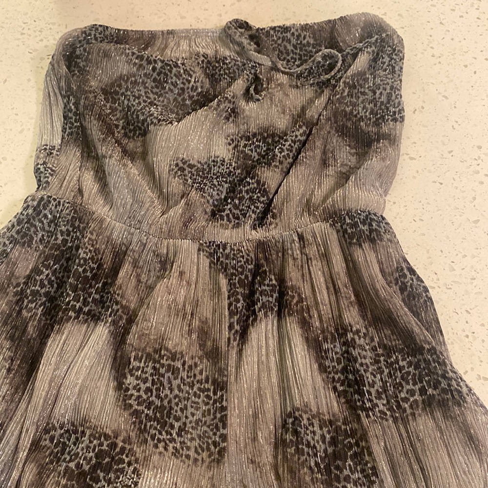 Silver romper worn once no flaws
